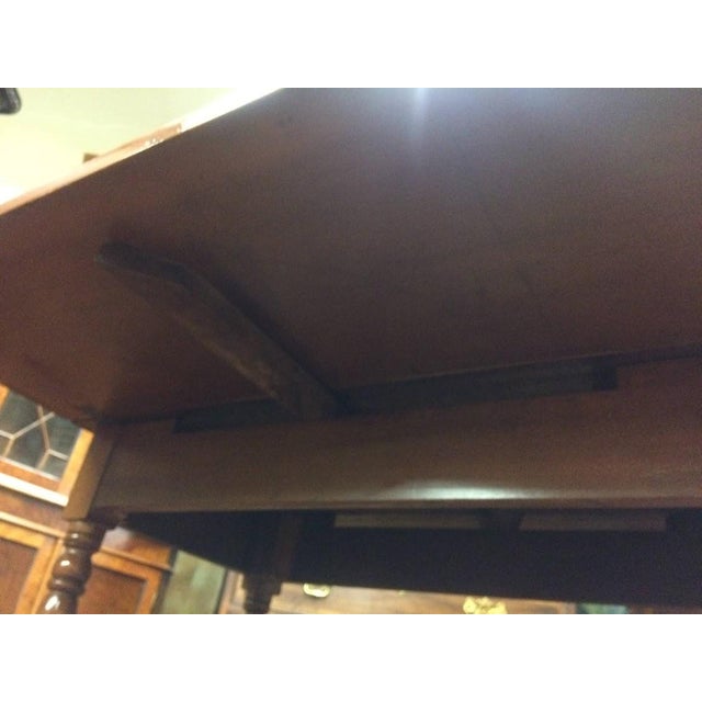 Item: Antique Maple Drop Leaf Table. Age & Condition: Circa 1930. Good condition, with some light signs of age or use....