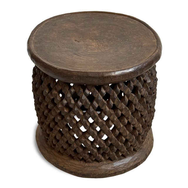 Authentic vintage hand carved Bamileke tribal wood stool/side table. Masterfully crafted from one piece of indigenous...