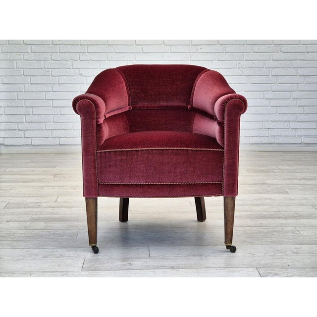 1950s, Danish lounge chair in original very good condition: no smells and no stains. Red furniture velour, ash wood legs...