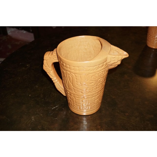 Add distinctive vintage character to your entertaining collection with this striking five-piece ceramic beverage set...