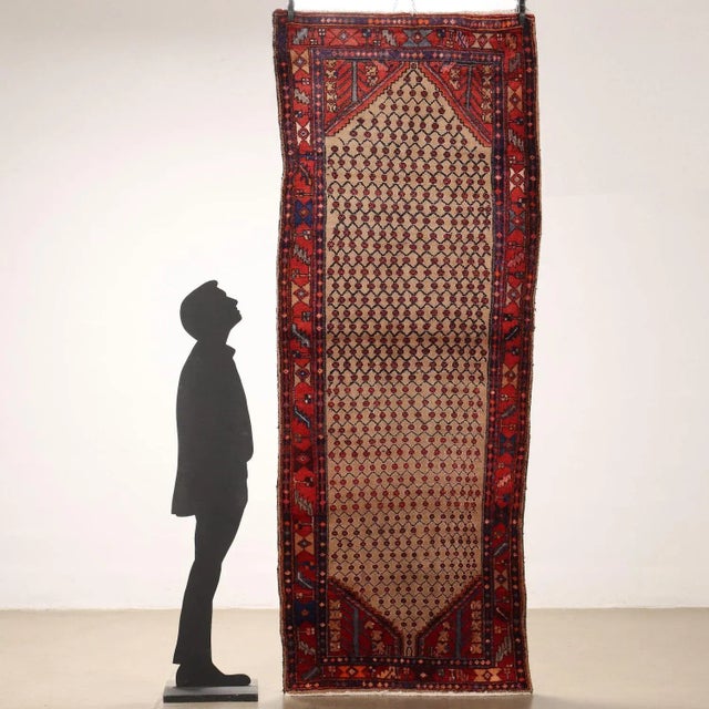 Malayer rug in cotton and wool; large knot, manual manufacturing. This piece is attributed to the mentioned...