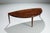 This large vintage “half moon” coffee table by Johannes Andersen is a striking example of refined Scandinavian modern...