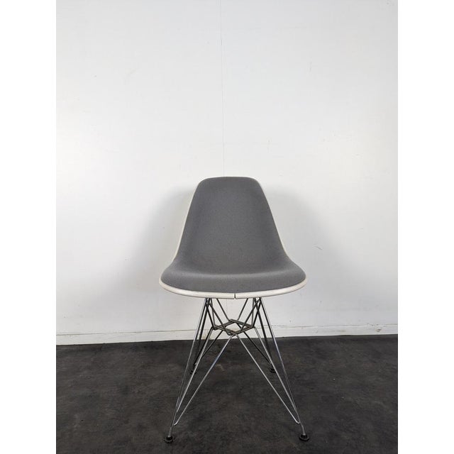 Upholstered Chair in Grey by Vitra Eames, in Very Good conditions.