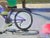 Early 21st Century Traces by Emma Kalff | Oil on panel Girl riding a purple bicycle on a sunny street. For Sale - Image 5 of 5