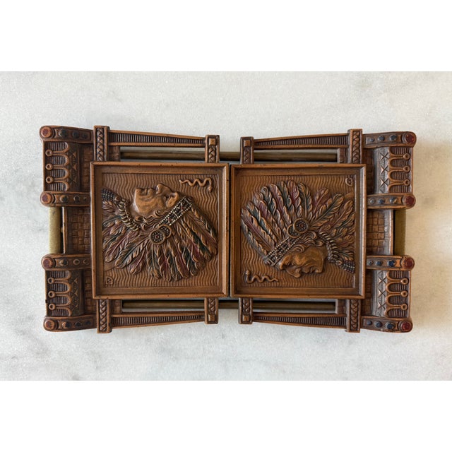 Antique adjustable/telescoping cast iron Native American war chief book rack with a faux bronze/copper finish. Made by...