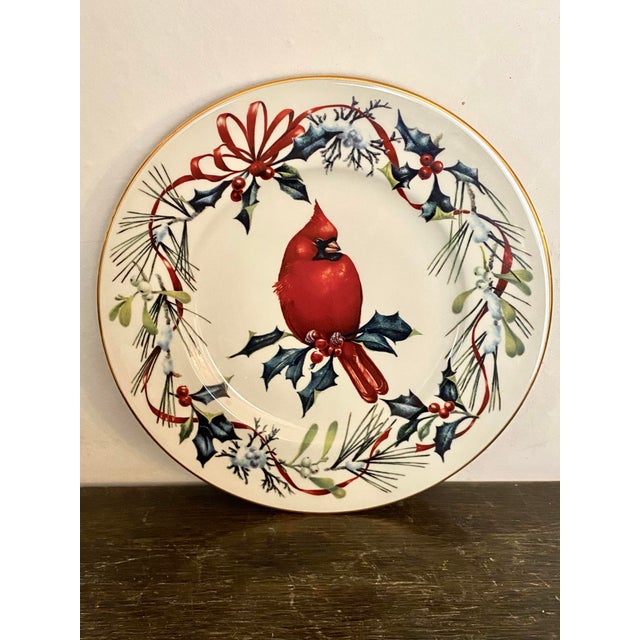 Pair of Lenox high quality bone china Winter Greetings Cardinal accent luncheon plates designed by Catherine McClung in...