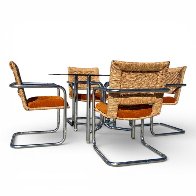 Vintage Chromcraft Chrome and Woven Five-Piece Dining Set. A vintage five-piece dining set by Chromcraft Corp. comprising...