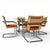 Vintage Chromcraft Chrome and Woven Five-Piece Dining Set. A vintage five-piece dining set by Chromcraft Corp. comprising...