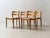 An elegant set of four chairs by danish designer niels o. Møller, produced by j.l. Møllers in the 1960s. The chairs...