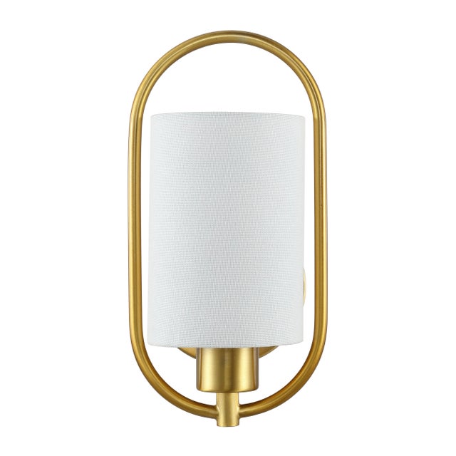 Introducing the HALDEA, a 6.25 inch brass iron wall sconce that brings timeless elegance to any space. With its sleek...