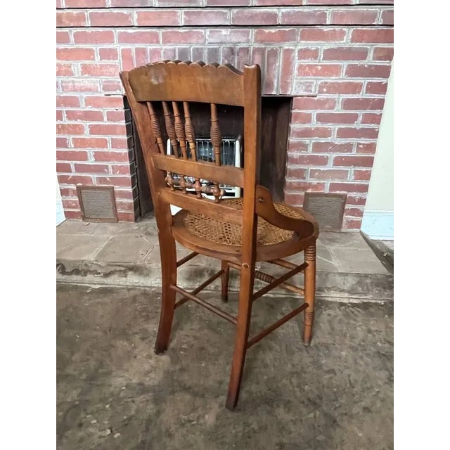 Early 20th Century Antique Victorian Eastlake Style Walnut Carved and Spindle Cane Seat Dining Side Chairs- Set of 4 For Sale - Image 10 of 11