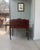 This 19th-century stepped writing desk is captivating with its scalloped gallery, twisted columns, and the depth of its...