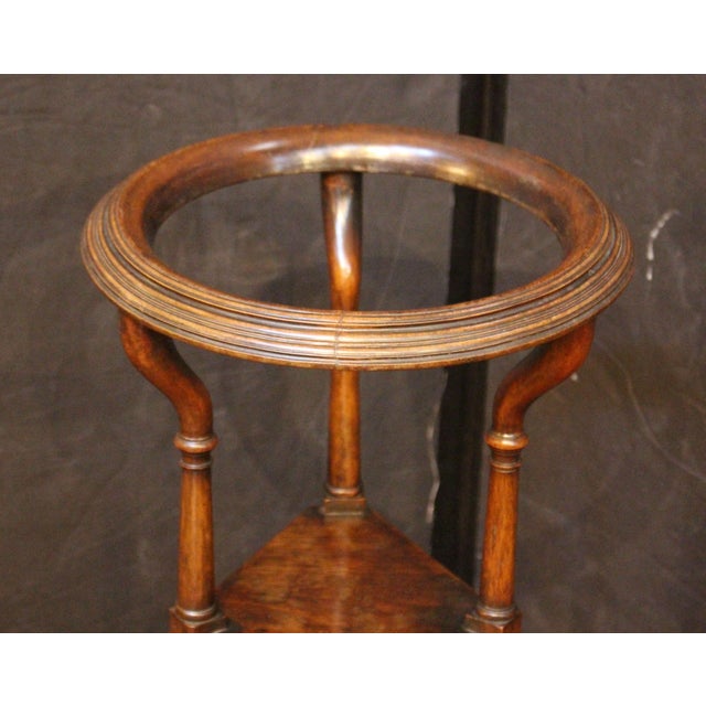 Circa 1750-80 basin or wig stand table, English. Mid-Georgian period. Mahogany. Handsomely proportioned. S-scroll carved...