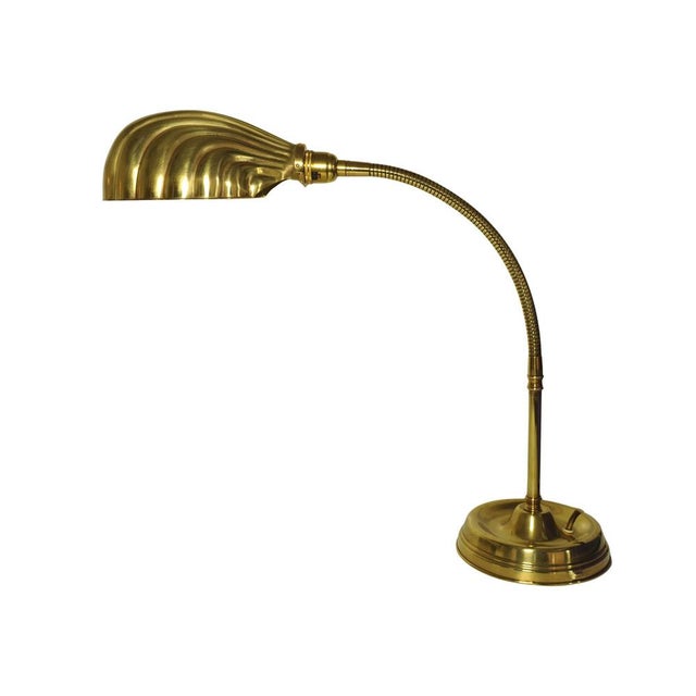 Early 20th century Art Deco articulated brass gooseneck desk lamp with decorated Brassed Copper Shell Shaped Shade on a...