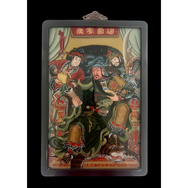 A powerful Mid Century Chinese Reverse Painting of The Warlord, General Guan Yu (The Legendary God of War) and Retainers,...