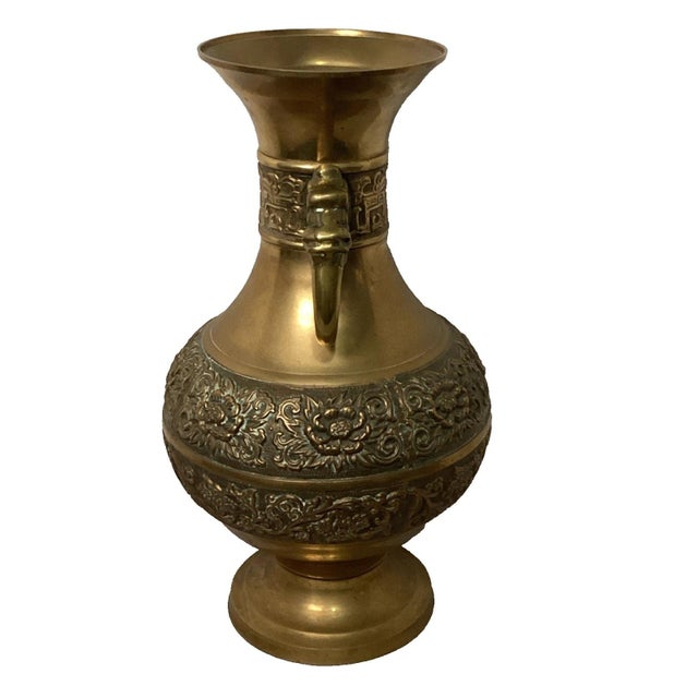 This vintage solid brass urn is a decorative piece of Chinoiserie, featuring a bulbous body with a flared rim and pedestal...