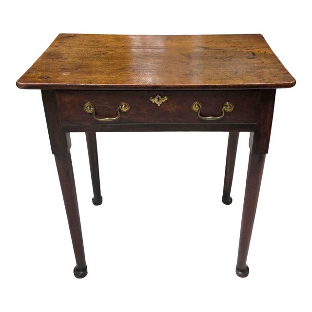 This 18th-Century Oak Lowboy is a modest and unembellished tilitarian antique piece with a lovely profile and size that...