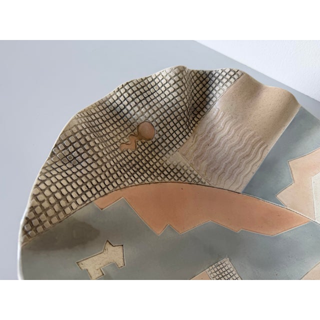 Striking 1980s studio pottery bowl by Barbara Demery, featuring an organic sculptural form with a dramatic pinched and...
