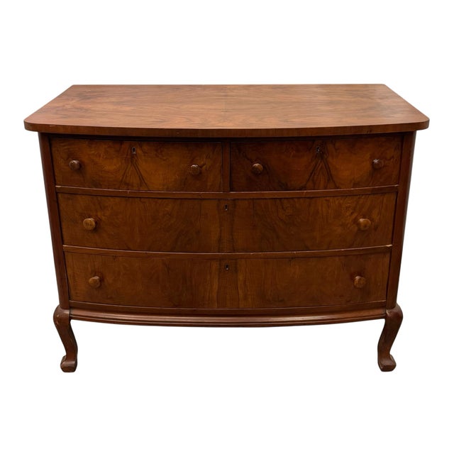 Vintage Traditional Colonial Style Chest of Drawers featuring High Quality Mahogany Construction, Beautiful Burl Wood, and...