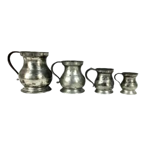 Set of Four Yates & Birch English Pewter Graduated Pitchers