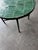 Round coffee table handcrafted in Morocco using traditional zellige techniques. The tabletop is composed of individually...