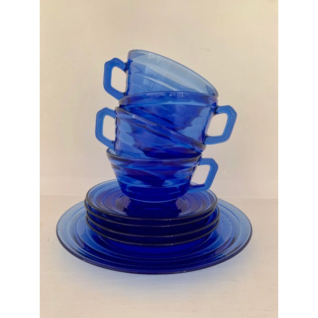 The cobalt blue color of Art Deco “Moderntone” by Hazel Aflas is head turning in color and draws the attention...