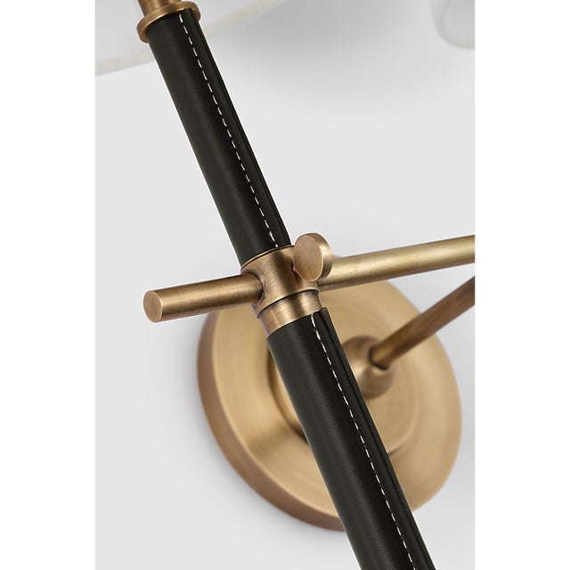 Bryant Large Wrapped Double Tail Sconce in Hand-Rubbed Antique Brass and Chocolate Leather with Linen Shades Designer:...