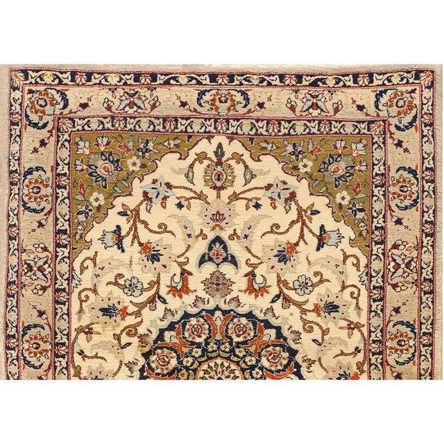 This exceptional 1940 Antique Isfahan Silk Formal rug is a highly refined masterpiece originating from the celebrated...