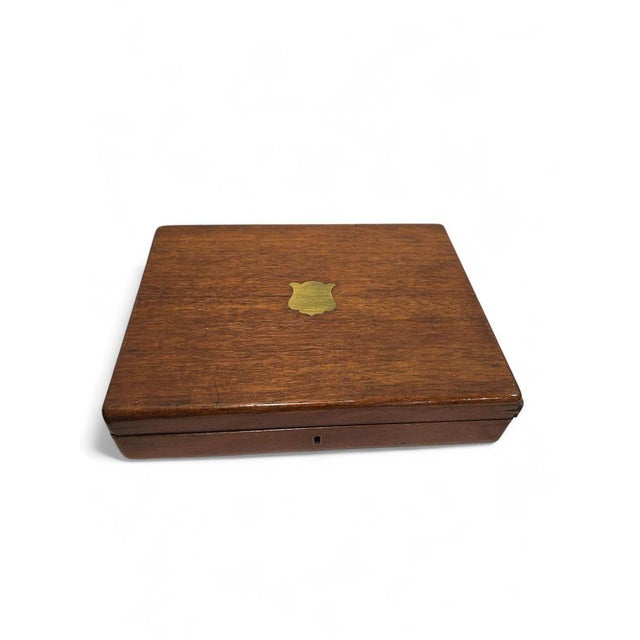 Elegant English boxed set of twelve fish knives, dating from the 19th century and preserved in its original fitted case....