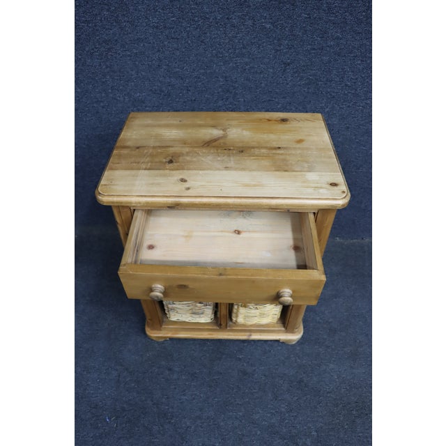 Gaines McHale Pine basket sideboard with drawer, also functions as nightstand or extra storage piece.
