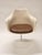 Tulip chair with armrests, white with brown leather upholstered seat cushion. Designer Eero Saarinen. Manufacturer Knoll....