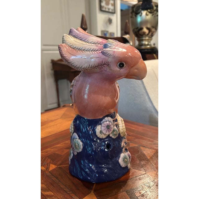 A delightful figure with an interesting face and great colors. Great display item or gift for bird collectors.