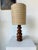 Old table lamp or desk lamp in solid oak, in turned wood with its elegant rounded shapes, from the 1950s. We love the...