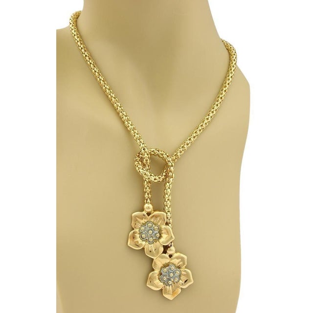 This magnificent eye catching necklace is crafted from 18k yellow gold in a high polished finish. The long chain is a...