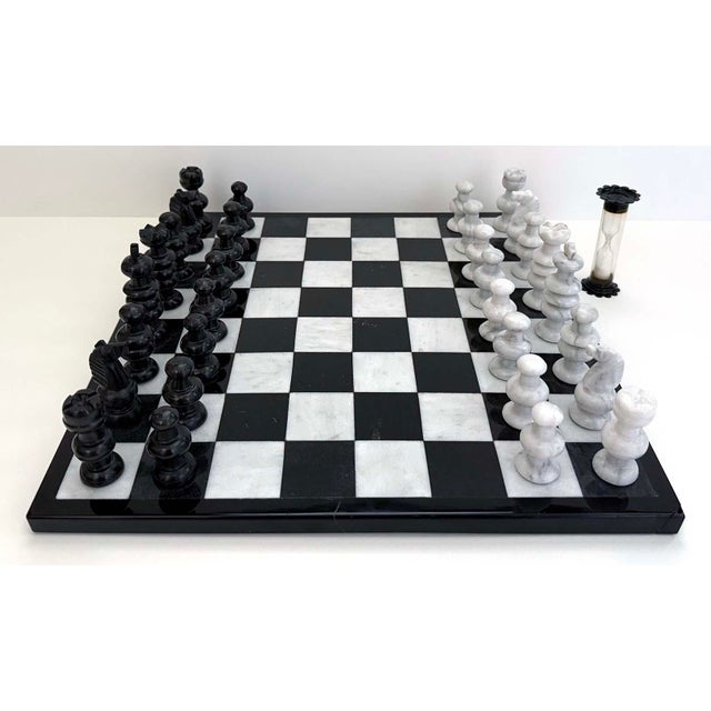 Vintage handmade marble chess board and pieces. This unique marble chessboard has inlayed white and black squares inside a...