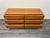 An elegant Titina Ammanati & Gianpiero Vitelli architectural design cherrywood commode comprising of six large streamlined...