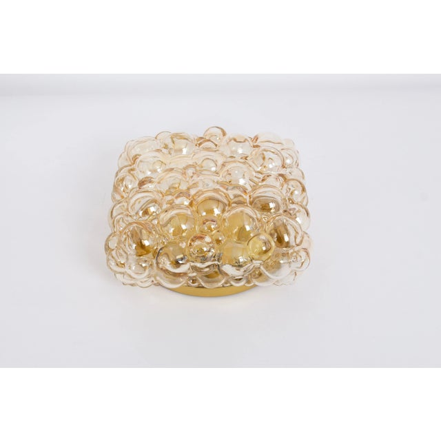 Large amber bubble glass sconce in style by helena tynell, germany. High quality and in very good condition. Cleaned,...