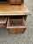 Rich in character and charm, an antique weathered French Oak writing desk having stepped back with multiple little drawers...