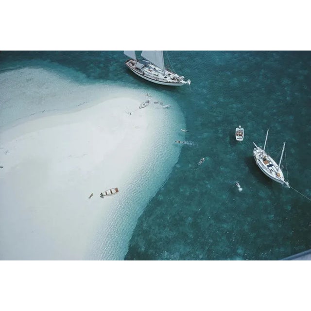 Stocking Island, Bahamas 1964 by Slim Aarons Slim Aarons Limited Estate Edition A high angle view of people swimming next...