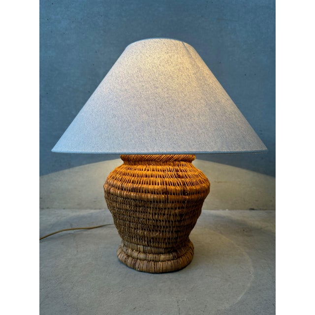 Vintage table lamp. A fairly heavy base (metal frame, woven with rattan). The base is handcrafted and therefore not...
