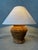 Vintage table lamp. A fairly heavy base (metal frame, woven with rattan). The base is handcrafted and therefore not...