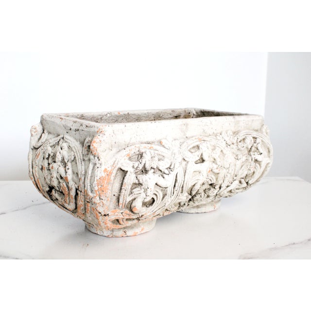 Pretty weathered oval French style cache pot with elegant footed bottom. For indoor or outdoor use.