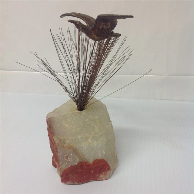 A Signed C. Jere Seagull & Rushes Sculpture from 1970 on natural quartz base.