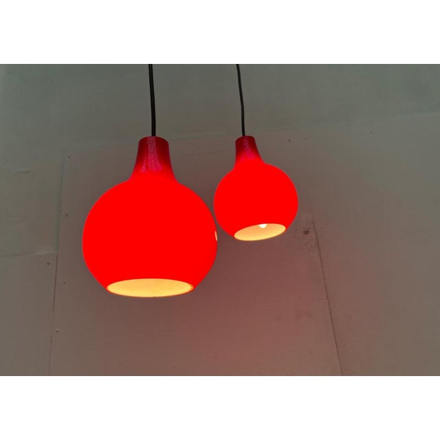 Mid Century Glass pendulum from the renowned manufacturer cleaner in a very special colors. The luminaire bodies made of...