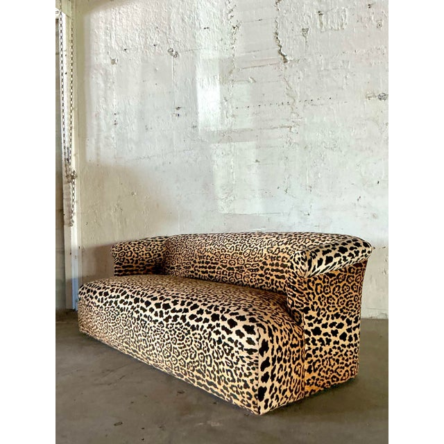 A true showstopper, this vintage leopard print sofa is the epitome of Hollywood Regency glamour. Its sleek, low-profile...