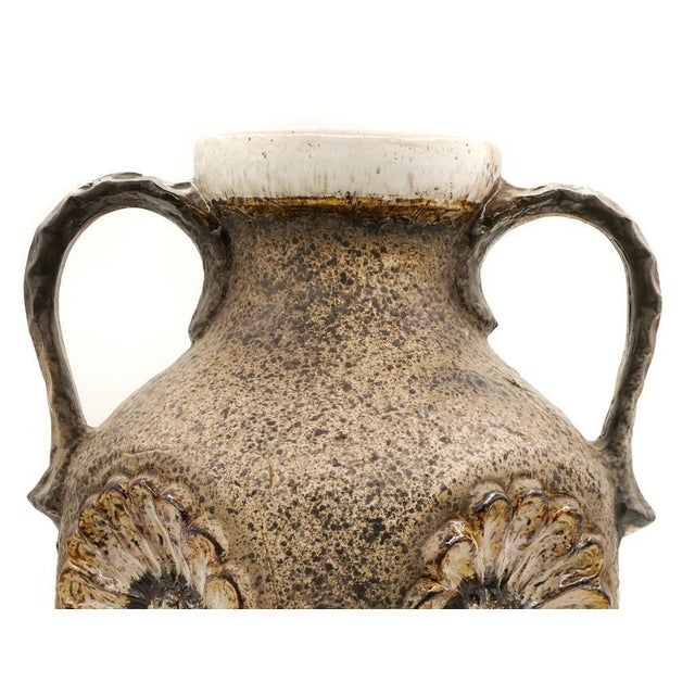 This vintage ceramic vase is a ceramic decorative object manufactured in Germany by Dümler & Breiden during the mid-20th...