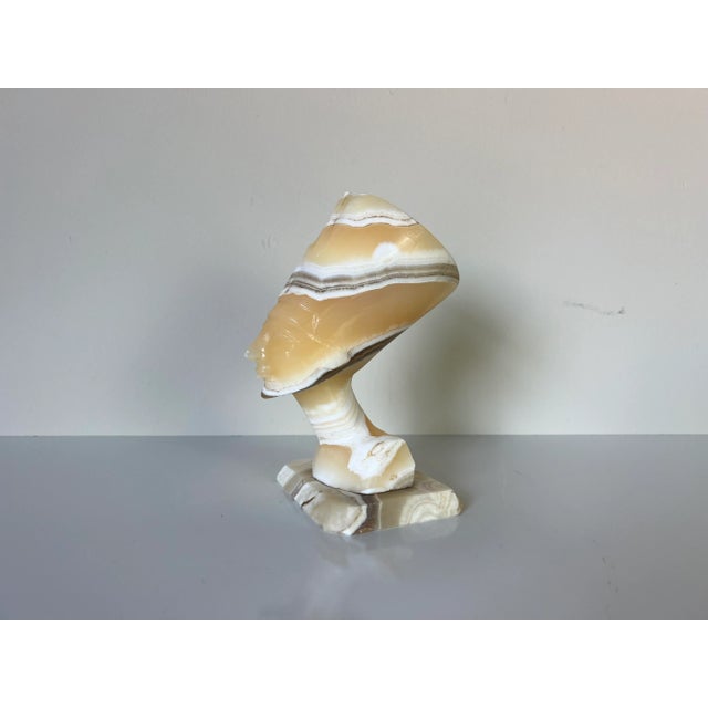 A classic Vintage Egyptian Queen Nefertiti altar head bust decorative sculpture. Some wear with a nice patina, but this is...