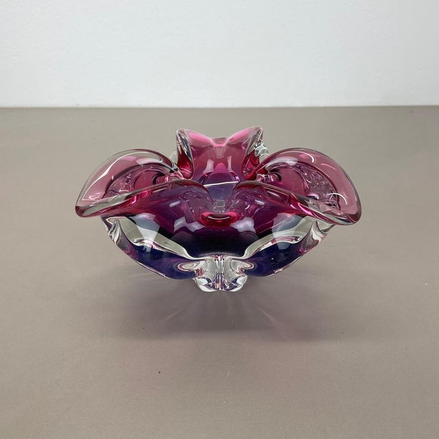 Article: Murano glass bowl, ashtray element Origin: Murano, Italy Decade: 1970s This original glass shell bowl was...
