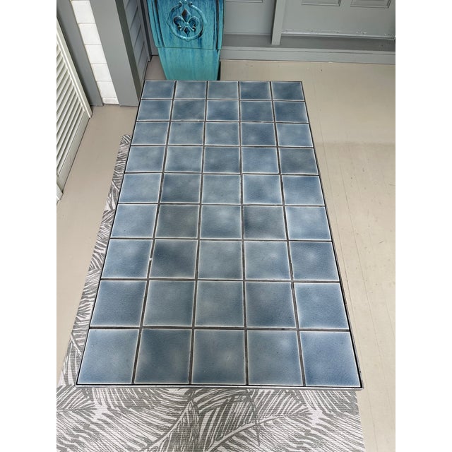 Being offered is this beautiful Slate blue tile top very heavy indoor/outdoor conversation cocktail coffee table. The...