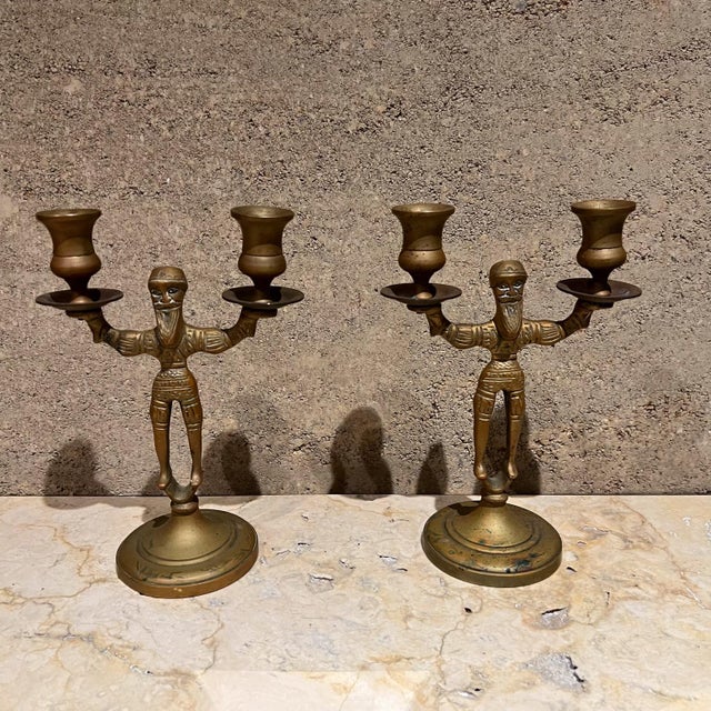 For your consideration, a pair brass double candlestick holders candelabra. Russian Bearded Man. Appears made in Russia....